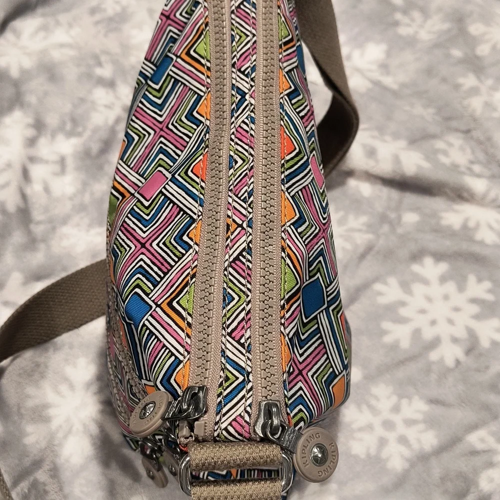 Kipling dual zip wipeable geometric print bag, EUC, 13